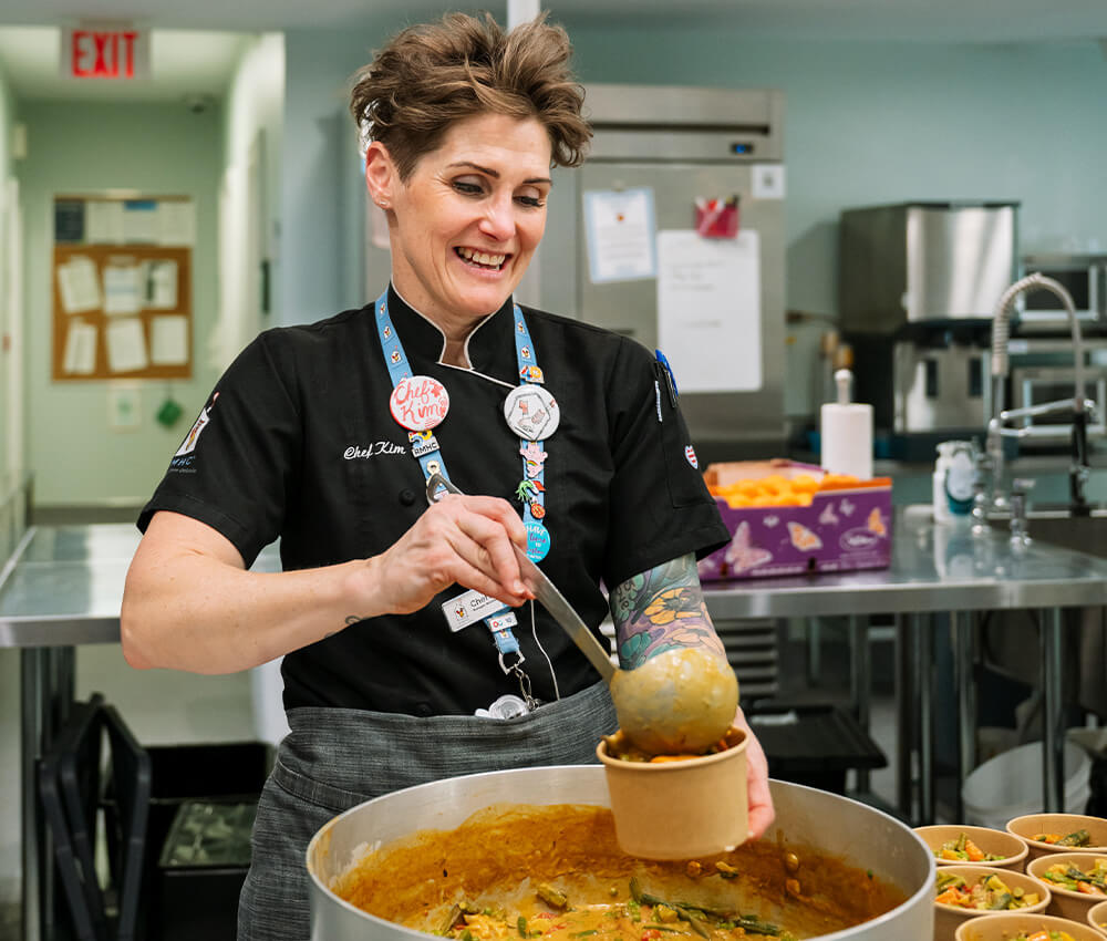 The chef prepares meals in the kitchen