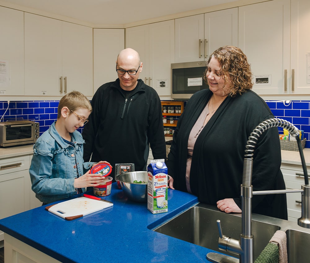 Family preparing meal in the kitchen