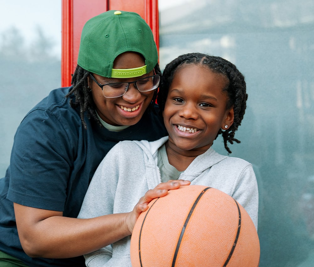 Family play together with basketball