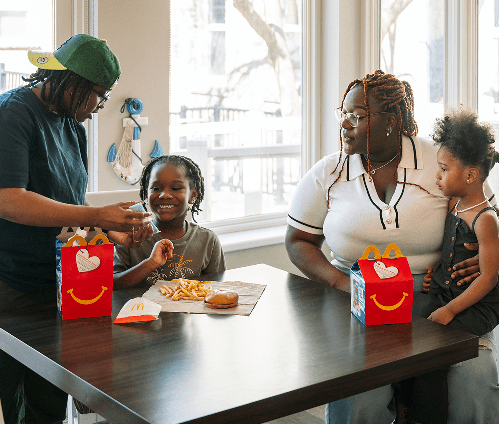 Family enjoying a McDonald's Happy Meal