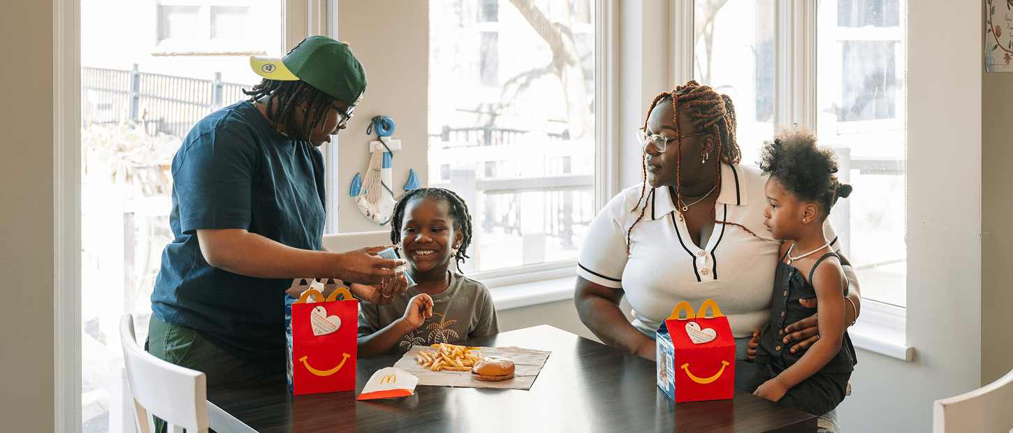 Family enjoying a McDonald's Happy Meal